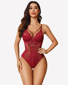 Burgundy lace bodysuit with plunging neckline and sheer corset panel