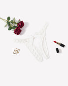 Low-rise lace thong, white floral lace with scalloped trim and center bow