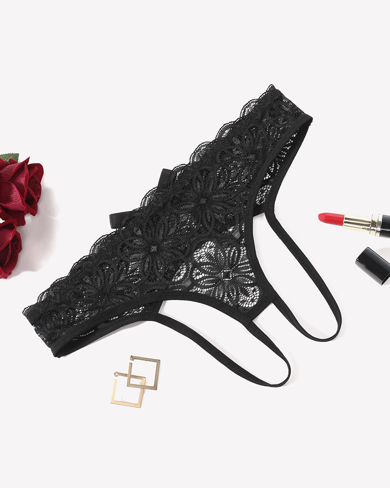 Black lace briefs with openwork rear, scalloped edges, adjustable ribbon ties.