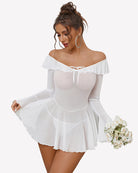 White off-shoulder ruffle mini dress with long sleeves and lace-up neckline