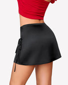 Black satin A-line mini skirt with elastic waistband and side drawstring ties