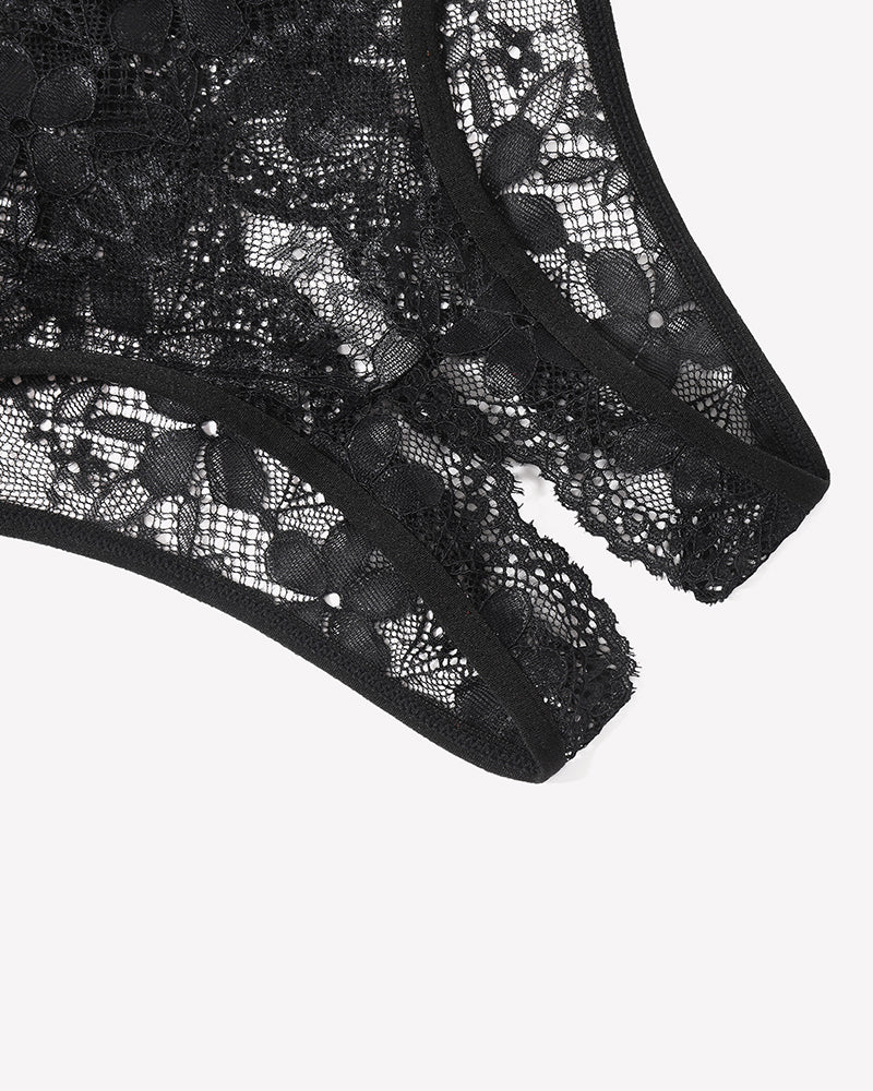 Close-up of floral lace briefs hem in black with scalloped edge and sheer mesh