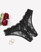 Floral lace thong with hollow-out back and black bow, scalloped sheer lace