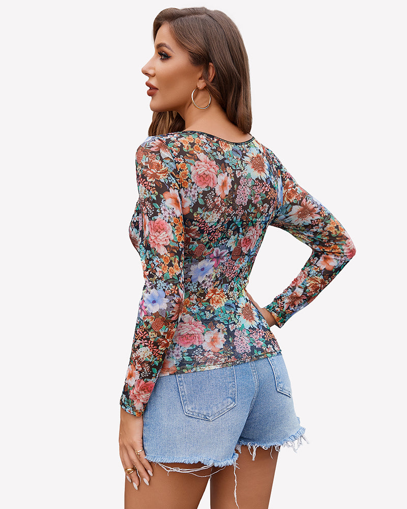 Floral mesh long sleeve top, crew neck, fitted silhouette from side view