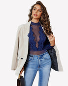 Blue lace turtleneck bodysuit with long sheer sleeves and high-cut thong bottom