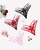 Assorted lace panties with criss-cross straps in black, red, and pink