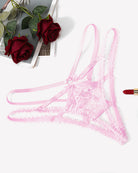 Pink lace thong panties with crisscross straps and scalloped lace trim