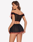 Black lingerie set with red ruffled trim, off-shoulder top and mini skirt (side view)