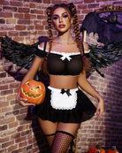 Black off-shoulder mesh top with white lace trim and bow; black mini skirt with scalloped lace