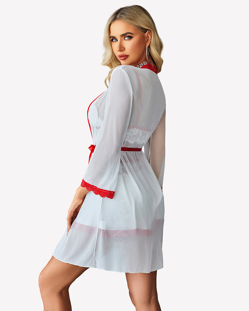 White sheer robe over lace bralette and satin shorts with red lace edging