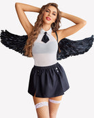 Halter mesh bodysuit with black slit mini skirt, white bodice, black bow neck and feather accents