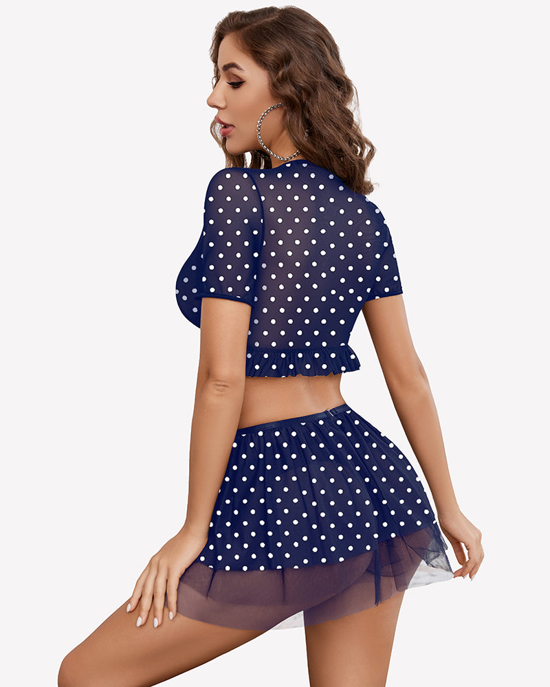 Navy mesh mini skirt set with white polka dots and ruffled hem, back view
