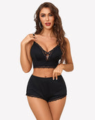 Black lace-trim cami pajama set with matching shorts, scalloped V-neck design