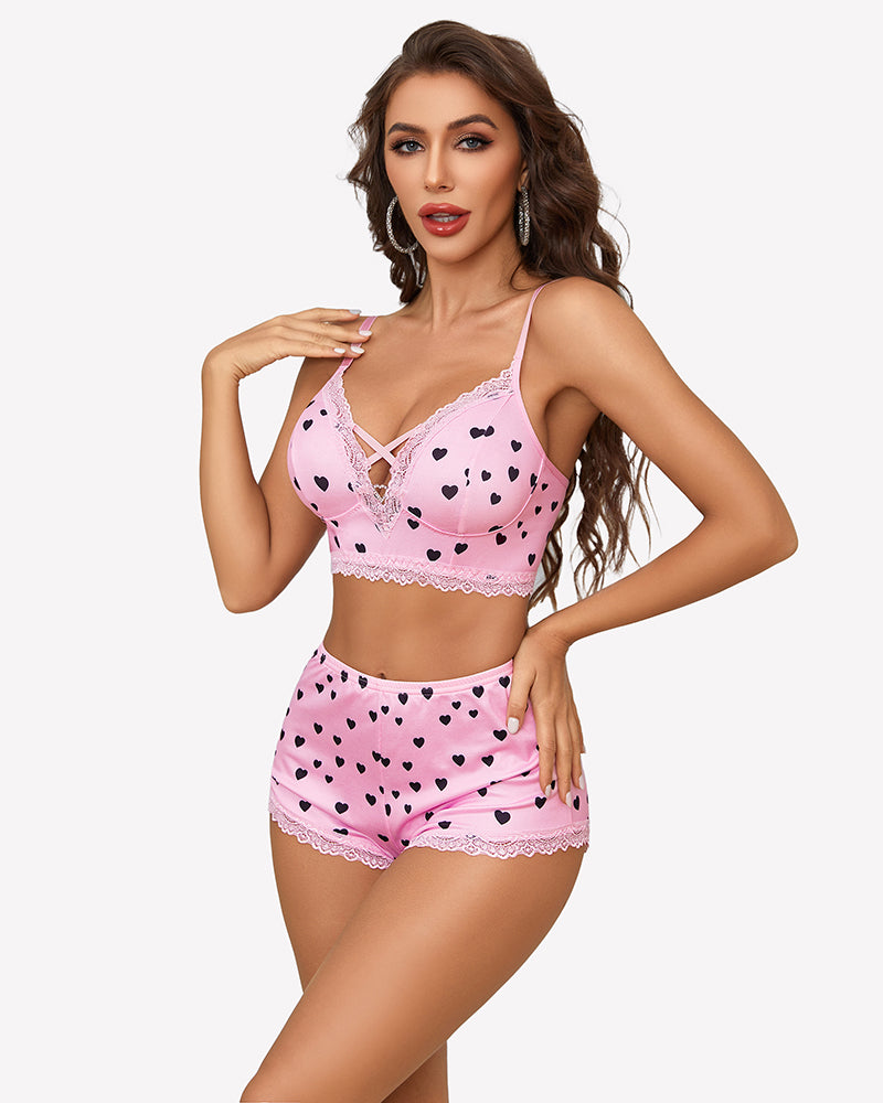 Pink heart print lace-trim cami pajama set with cross-strap bralette and shorts