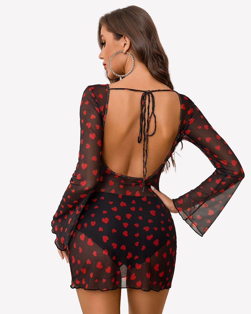 Backless mesh mini dress with red heart print and tie-back, flared sleeves.