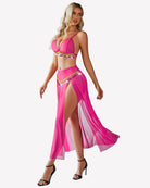 Hot pink sheer bra top and split maxi skirt set with gold beaded trim, walking view