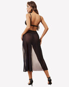Black sheer bra top and split maxi skirt set from the back, with gold beaded trim