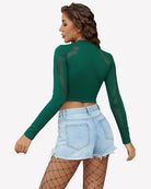Long-sleeve cut-out fishnet top in green, back view with openwork mesh sleeve panels