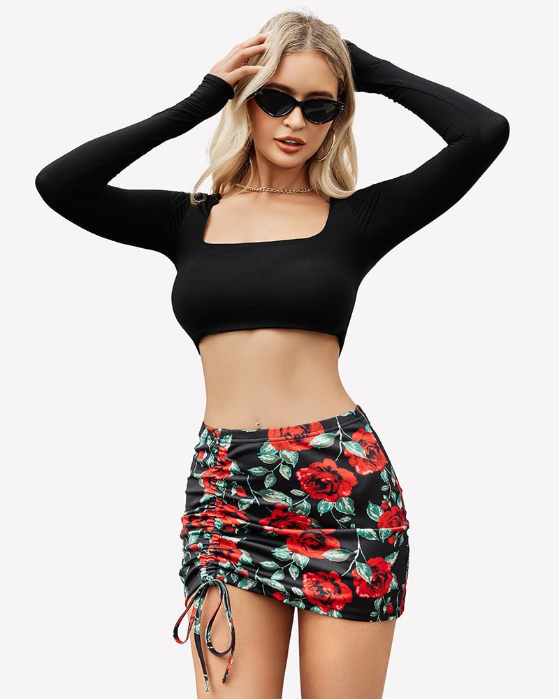 Floral ruched mini skirt with red roses and green leaves, gathered sides, adjustable ties