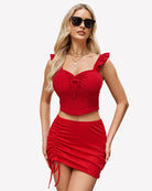Red ruched mini skirt with side drawstring ties and gathered drape, short length