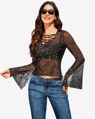 Black star-print bell sleeve V-neck top with crisscross lace-up front