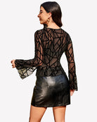Black geometric sheer bell-sleeve V-neck top, crisscross back detail
