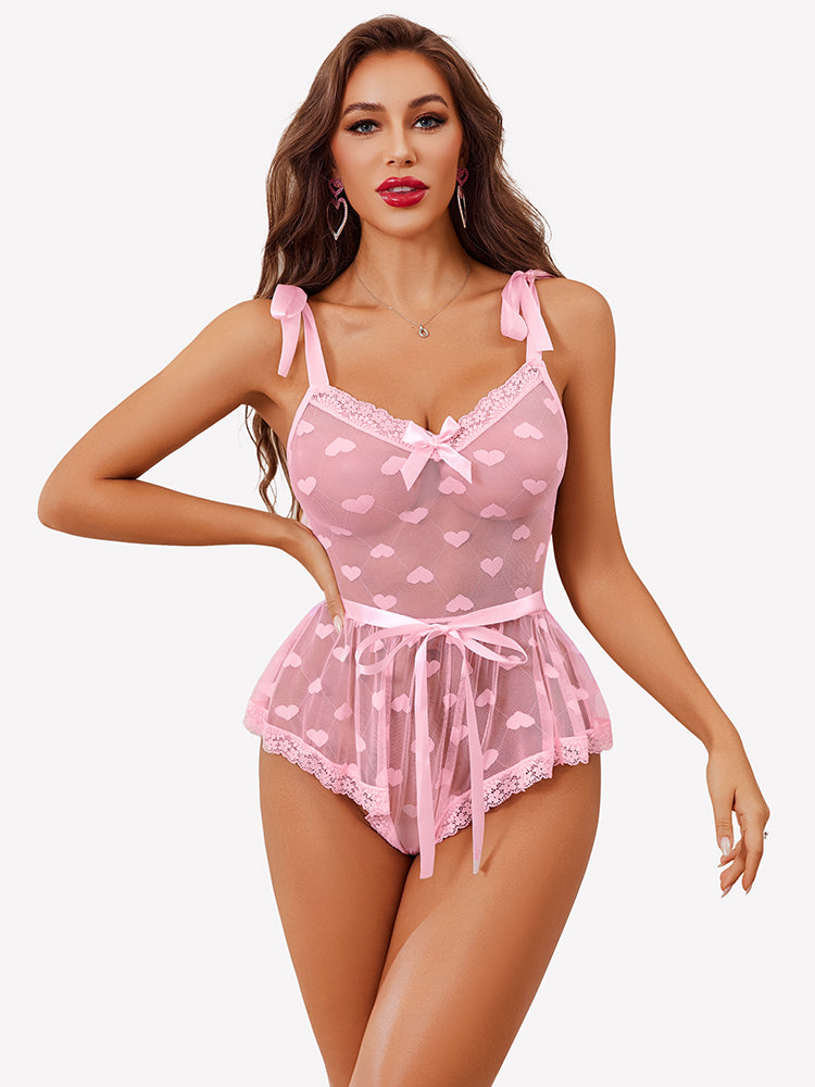 Light pink heart sheer mesh lace bodysuit with bow straps and ruffled waist