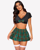 Plaid skirt set with black bow-front crop top and green plaid mini skirt