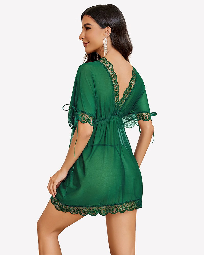 Green mesh short-sleeve dress with lace back detailing and tied waist, scalloped hem