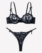 Black lace bra and thong set with heart pattern and bow strap accents
