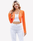 Sheer cropped cardigan, long sleeves, open front in bright orange.