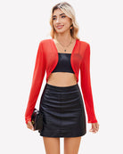 Sheer cropped cardigan, long sleeves, open front in red.