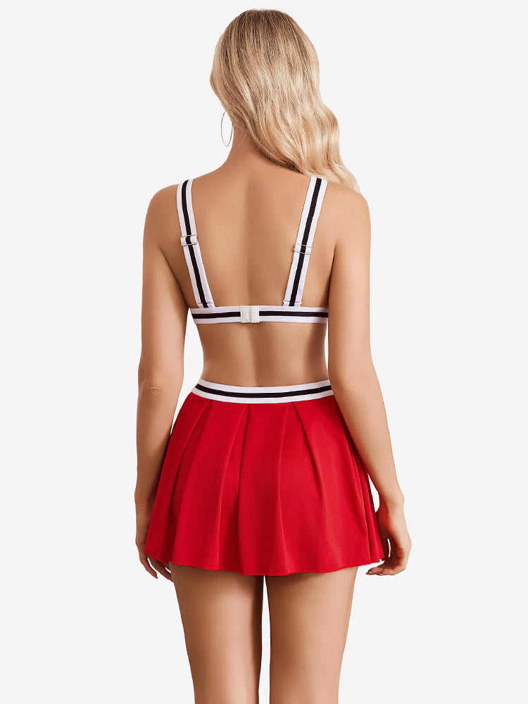 Hollow crop top and pleated skirt set, red back view with white-trim straps and pleated skirt