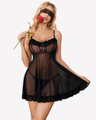 Sheer black babydoll nightgown with lace trim, tie-front bust, scalloped hem