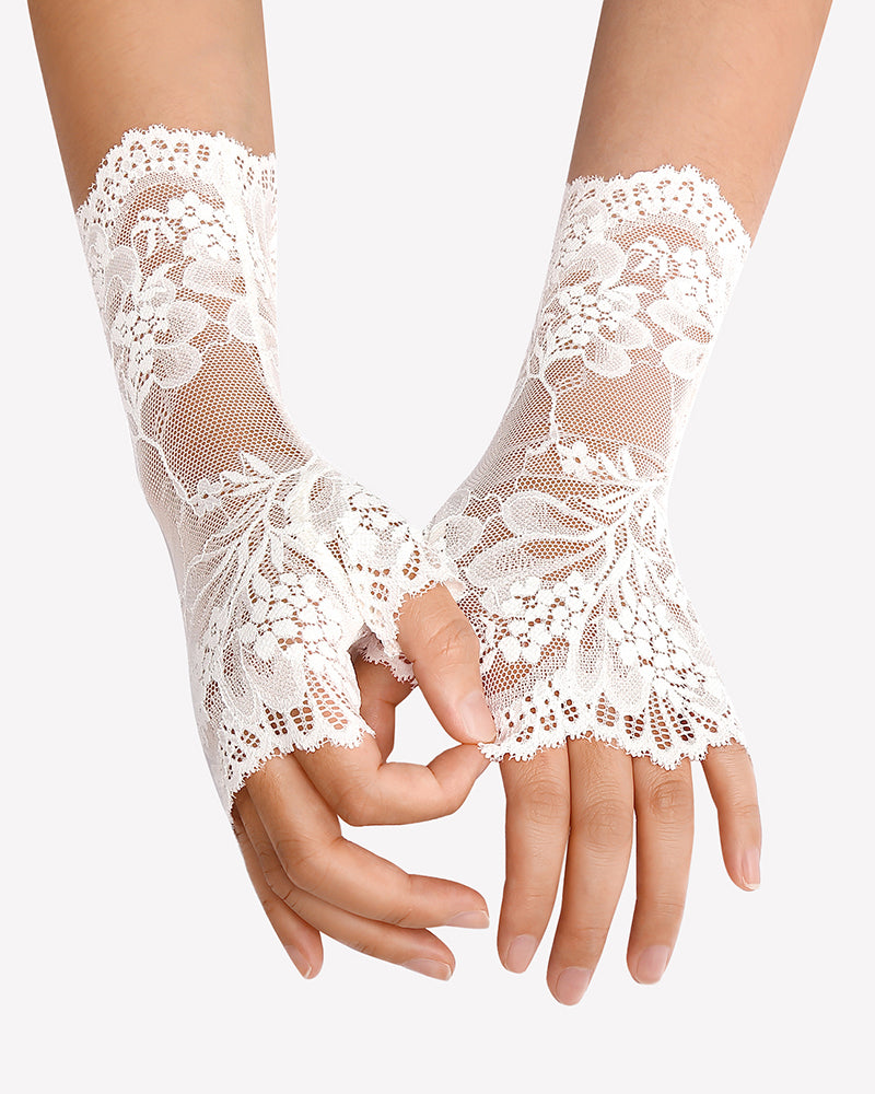 White lace fingerless wrist gloves with floral pattern and scalloped cuff edges
