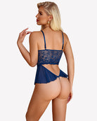 Lace bodysuit with mini babydoll peplum, dark navy lace cups and open back