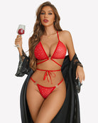 Red strappy bra and panty set with polka-dot cups and ribbon tie detail