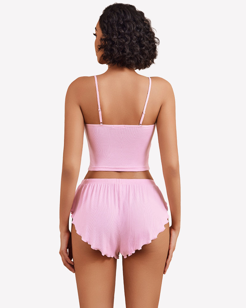 Ribbed pajama set in pink: strappy back cami top and ruffled elastic-waist shorts
