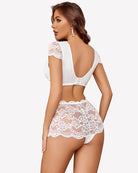 White lace bra and panty set, back view with lace-trimmed open back section