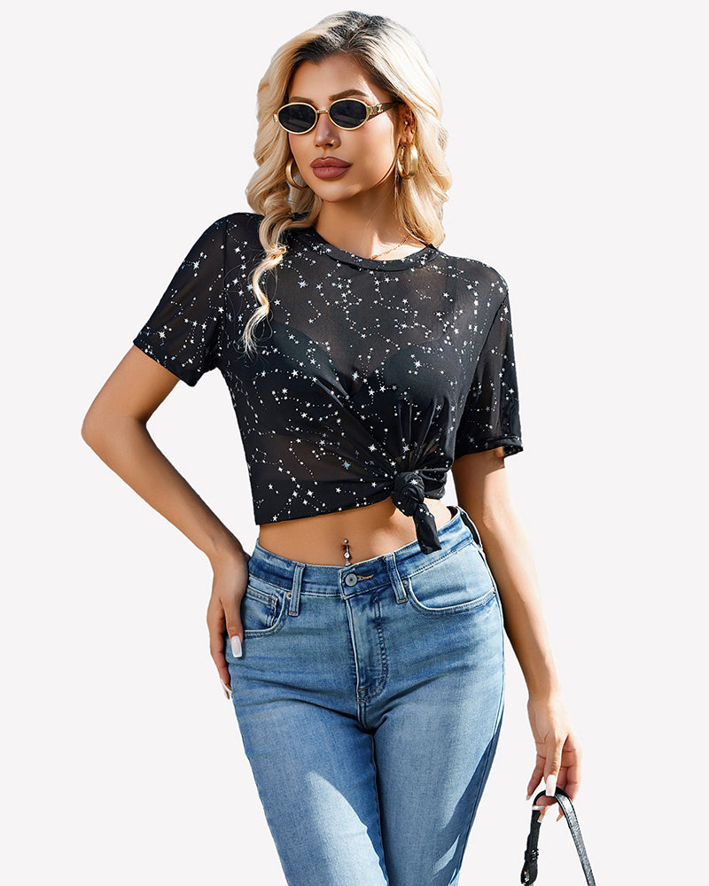 Mesh sheer top with crew neck, short sleeves, black star print, knotted front hem