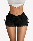 Ruched lace drawstring shorts, black with lace trim and side tie strings