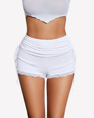 Ruched lace drawstring shorts, white with lace-trim hem and side tie strings