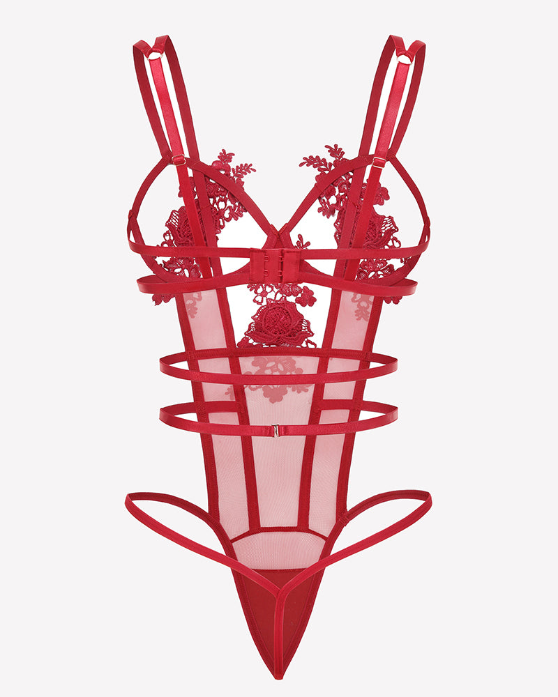 Red lace bodysuit with deep V shape, floral center panel, and crisscross straps