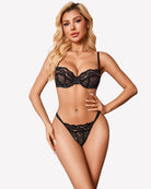 Black underwire bra and lace panty set with sheer cups and small dot pattern