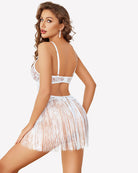 White lace babydoll lingerie with lace cups, crisscross back straps, and fringe skirt