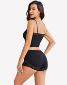 Black cami pajama set with lace-trim cami and lace shorts, full back view