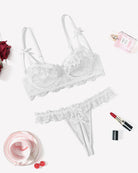 White lace push-up bra and thong set with bow straps and sheer mesh sides