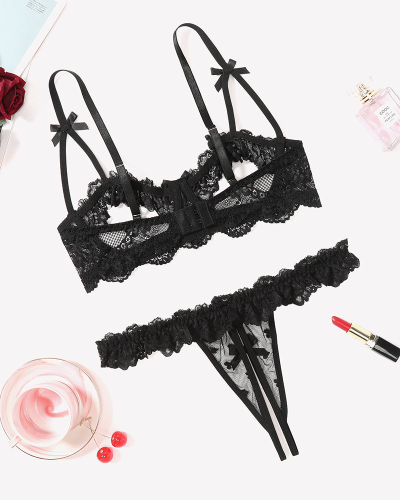 Black lace bra and thong set with cutout mesh panels and bow straps