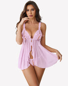 Light pink sheer mesh babydoll with lace-trim cups and matching thong, flowing skirt
