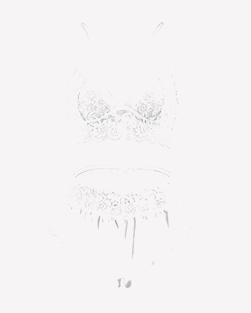 White sheer lace bralette and ruffled skirt panty set with no underwire